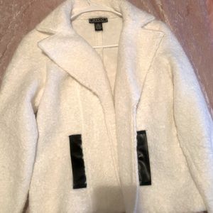 Small , white NYCC jacket ( worn once ) excellent condition